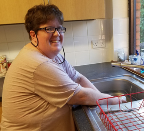 Woman washing up
