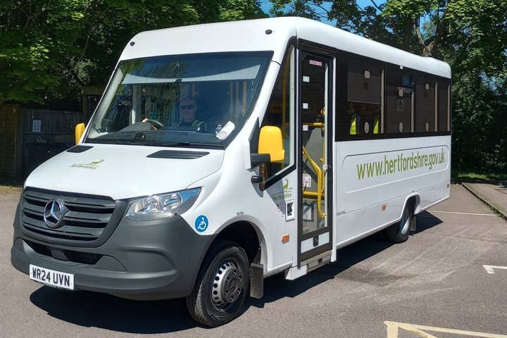 A minibus with www.hertfordshire.gov.uk written on the side.